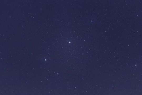 Orion's Belt with Alnitak, Mintaka, Alnilam stars. Night sky Background.