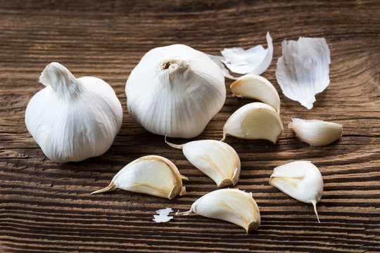 Garlic bulbs. Fresh garlic on the wooden table.