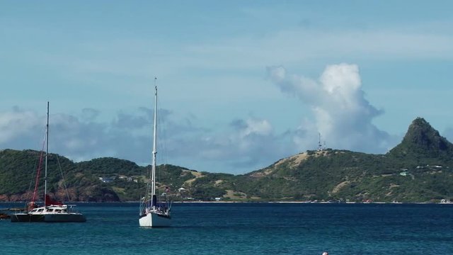 Sailing boats anchored near coast of Mayreau island, St Vincent and the Grenadines