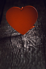 Fototapeta premium Heart shapes on rustic wooden background