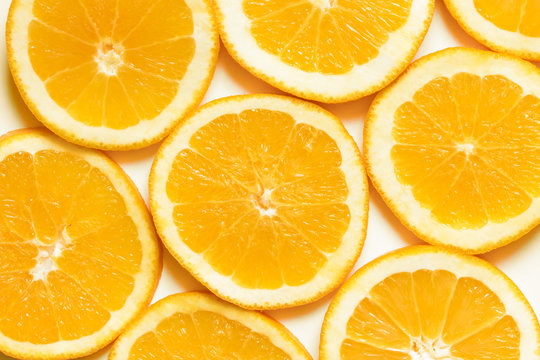 Fresh, juicy slices of orange. Orange fruit background 