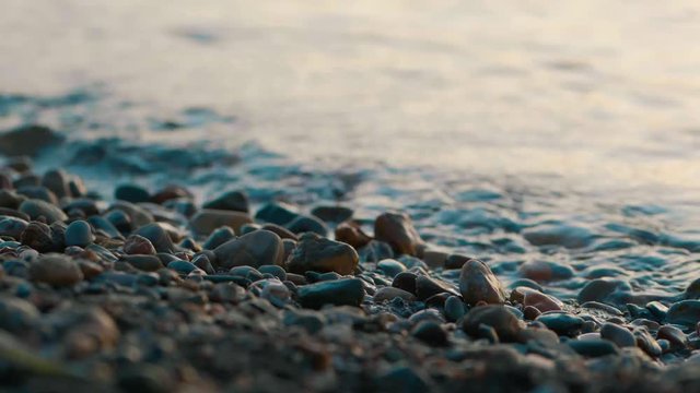 Closeup of a stony beach at evening