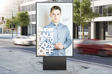 fashion advertising billboard on city street