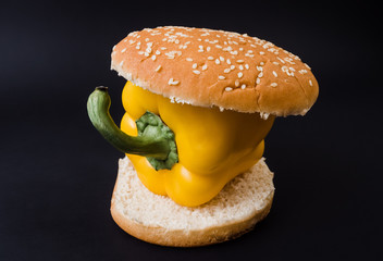 Vegetarian Burger concept. Fresh Paprika or Pepper in burger.