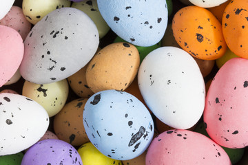 Colorful quail eggs. Easter background. 