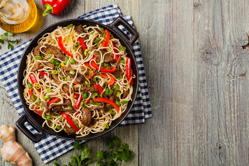 Chinese pasta with beef. Prepared in wok.