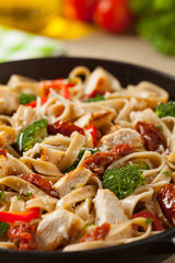 Whole-grain tagliatelle pasta with grilled chicken.