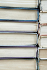 stack of old books pastel colors