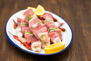 raw turkey fillet with pepper and lemon