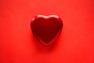 Heart and strawberry on a red Valentine's background