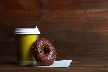 coffee and a brown donut