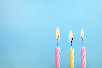 Three festive candles