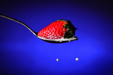 Stawberry Dropping in a Spoon