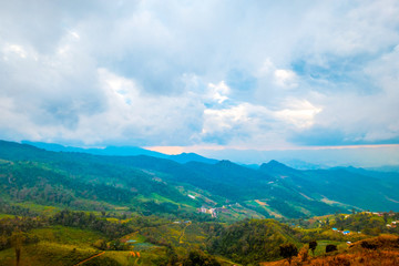 Fototapeta na wymiar high mountains peaks range clouds in fog scenery landscape national park view outdoor at Chiang Rai, Chiang Mai Province, Thailand