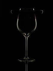 sunglasses on a glass for wine