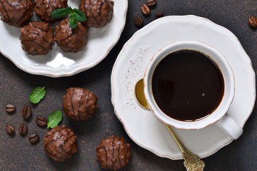 Chocolate shonfet with praline and mint with a cup of custard.