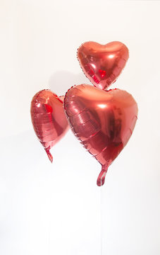 Three Shiny Red Heart-shaped Mylar Balloons