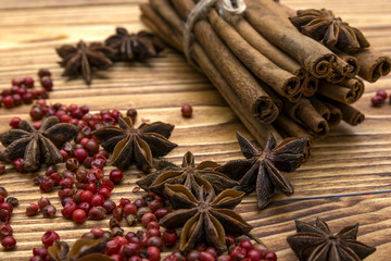 Cinnamon,star anise and red pepper are on the table