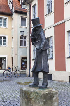 The monument to the famous story-teller Hoffmann with favorite cat Moore on the shoulder, Hoffmann Platz. Bamberg, Bavaria, Germany