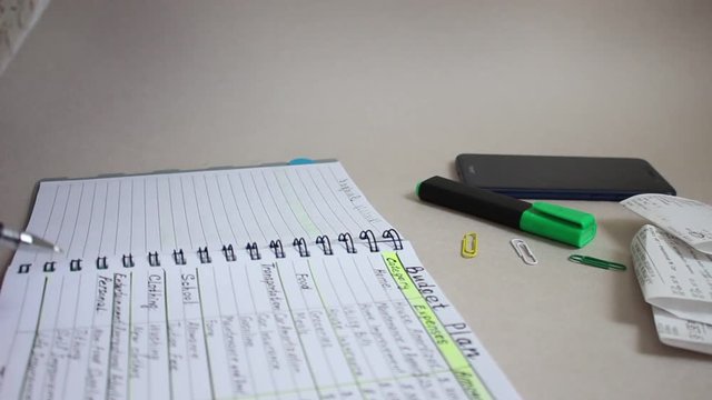 List of monthly household expenses for a basic budget. Monthly spending list. Payment receipts