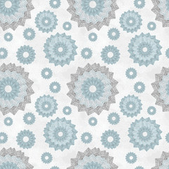 Seamless pattern with ornament of openwork lace round shapes. Geometric background with snowflake effect, pale blue and light gray. Delicate, airy, nice, soft, elegant, artistic image