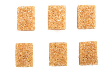 brown sugar cubes isolated on white background. Top view. Flat lay