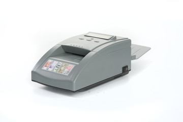 GOMEL, BELARUS - March 27, 2013: The device for authenticating the banknotes of the firm NTS Gomel on a white background.