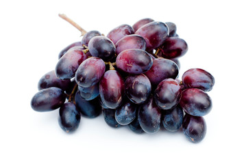 Close Up of Fresh Summer or Autumn Black Grape. Wine Variety. Isolated on White Background.