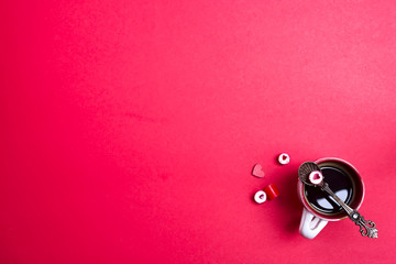 Red candy heart shape on spoon