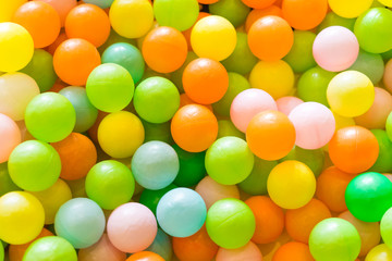 Many colorful balls at kids playground