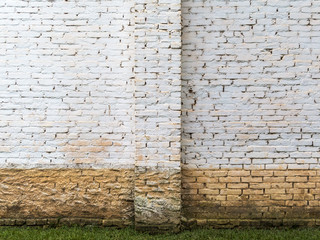 white brick wall with flood dirt mark on a farm house in brazil - horizontal