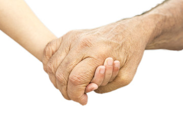 Fototapeta premium Hands of a grandfather and his grandson isolated in white