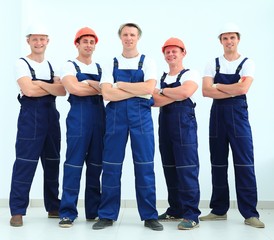 Obraz premium team of professional builders in helmets