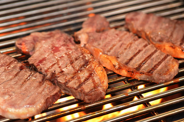 Beef steaks on the grill