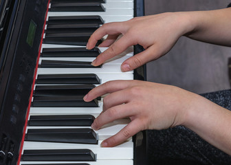 hands of a pianist close-up