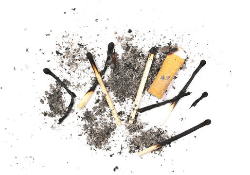 Cigarette stubs, burn matches and ash isolated on white background, top view