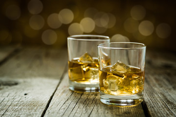 Cognac in glasses on rustic backgrpund