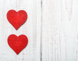 Fototapeta premium Love concept for mother's day and valentine's day. Valentine. Love. Valentine's Day postcard. Happy Valentine's day hearts on wooden background. Valentine card with space for text