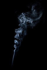 Blue smoke rising up in the air
