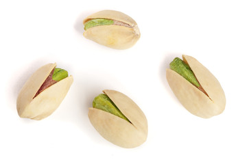 Pistachios isolated on white background, top view. Flat lay