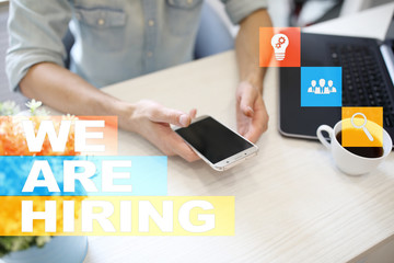 We are hiring text on virtual screen. Recruitment. HR. Human resources management. Business concept.