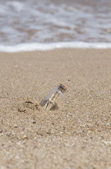 message in a bottle on beach