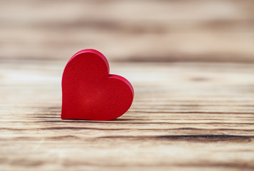 Fototapeta premium Love concept for mother's day and valentine's day. Valentine. Love. Valentine's Day postcard. Happy Valentine's day hearts on wooden background. Valentine card with space for text