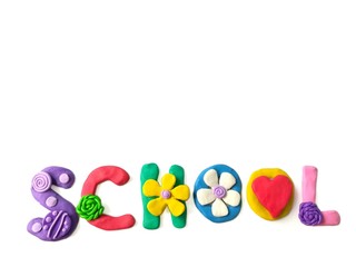 Colorful pasticine clay dough made are beautiful school text on white background