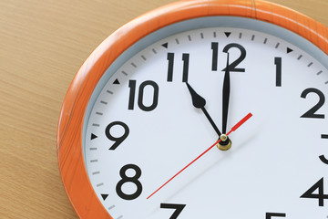 Focus time in clock of eleven o'clock for the design in your business concept.