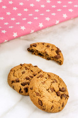 Chocolate chips cookies with pink starred textile