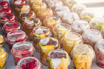 Fruit platter in cups on the counter in the market