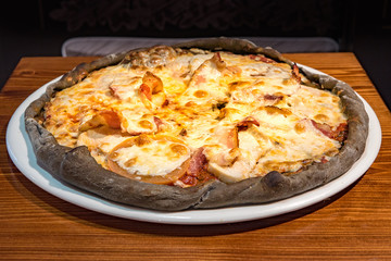 Hot delicious pizza freshly cooked in a cafe