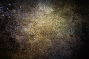 Detailed background imaged of brown cracked leather.