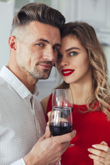 Portrait of a smiling romantic smart dressed couple